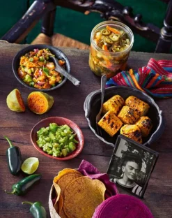 Frida Kahlo - Dinner at Frida's: 90 Authentic Mexican Recipes Inspired by the Life and Art of Frida Kahlo Hardcover Book